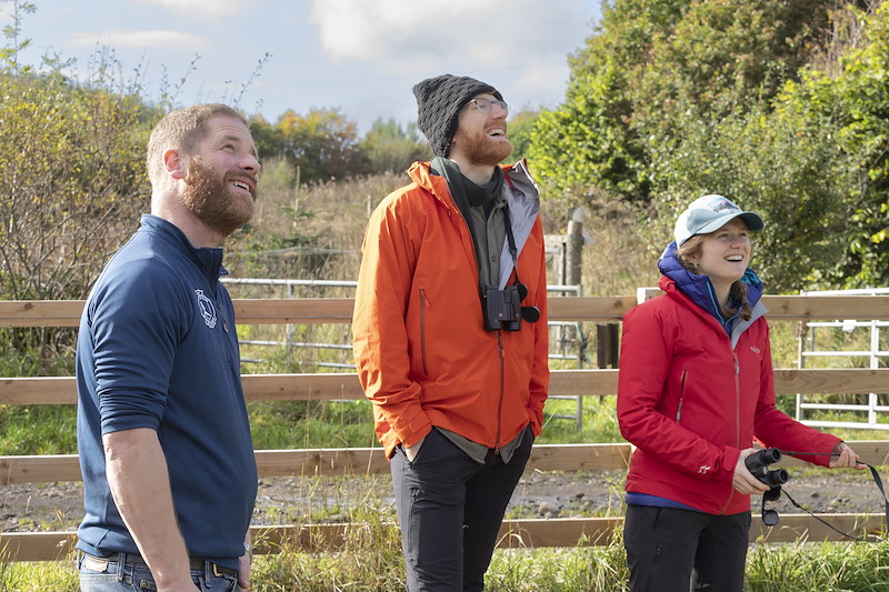 Tom Bowser, owner of Argaty Red Kite Centre, in conversation with visitors, Doune, Scotland