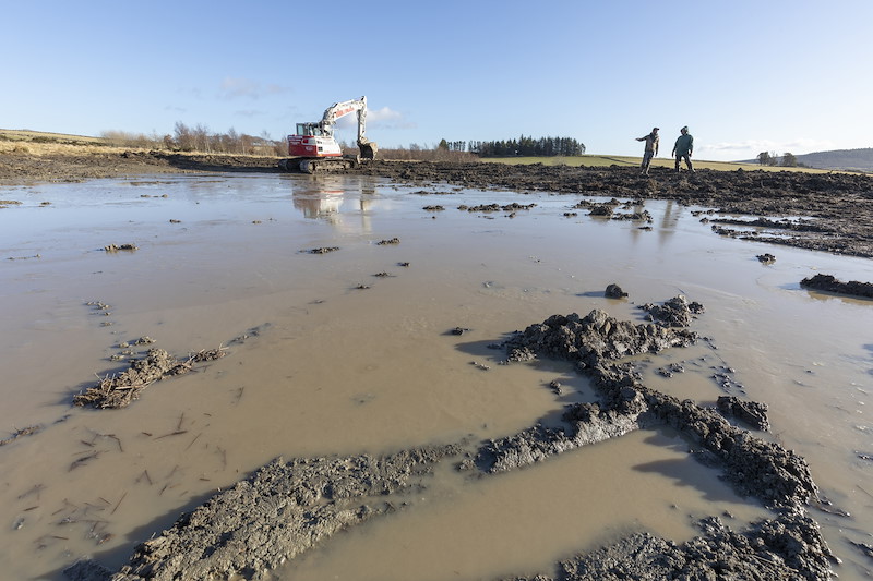 Landowner, Laurel Foreman,and contractor discussing creation of wetland habitat, Wark Farm, Aberdenshire
